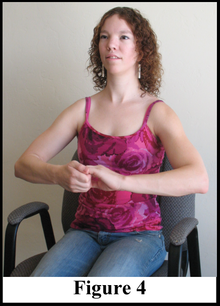 Photo showing how fibromyalgia patients can use their finger grips to exercise the muscles in their arms.