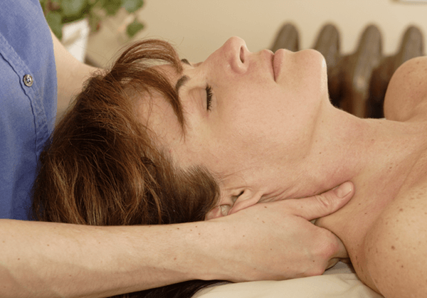 Photo of person receiving a massage, the number one alternative therapy for fibromyalgia.